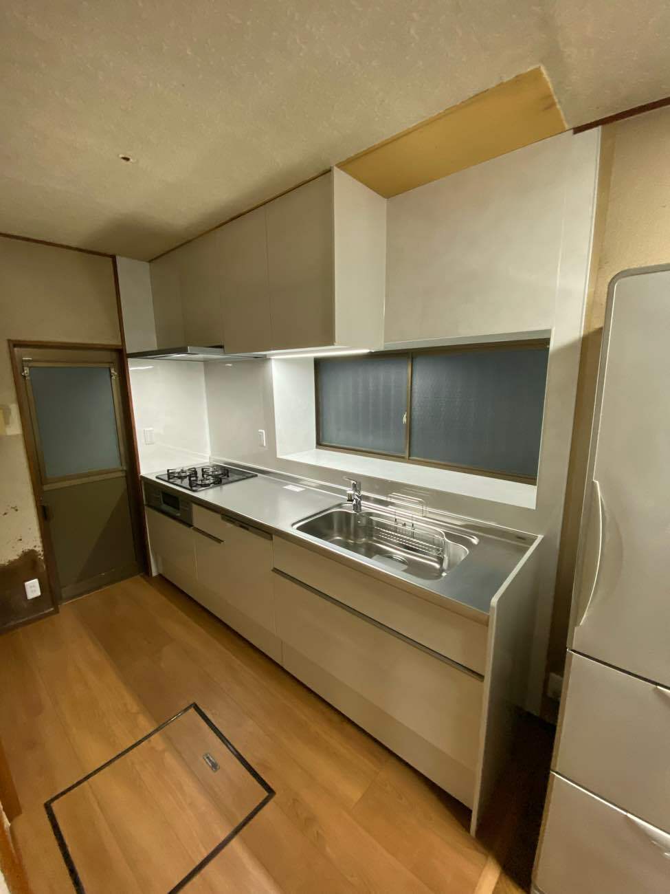 ダウンウォールで収納しやすいキッチンに