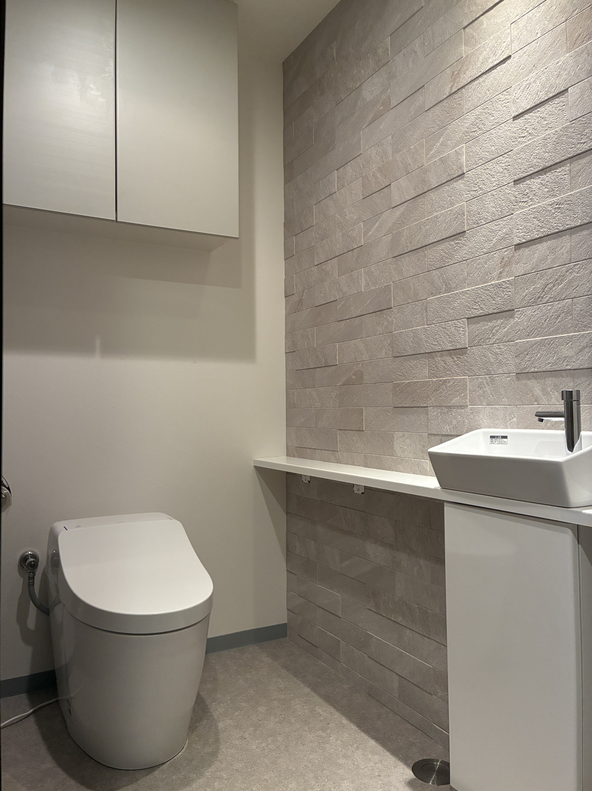 18年目のトイレ一新！床で魅せる上質リノベ